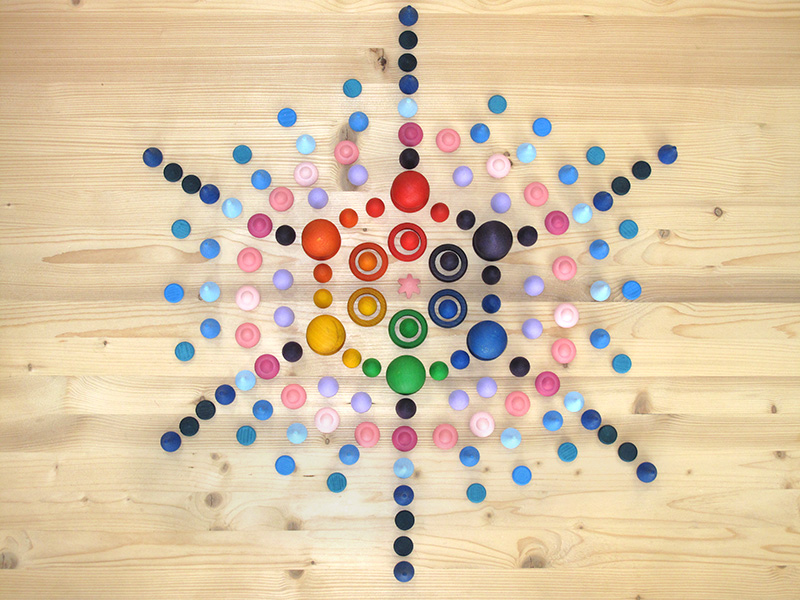 Mandala copo de nieve con piezas sueltas Grapat, visto desde arriba - Qué es el juego heurístico: ejemplos de actividades con piezas sueltas